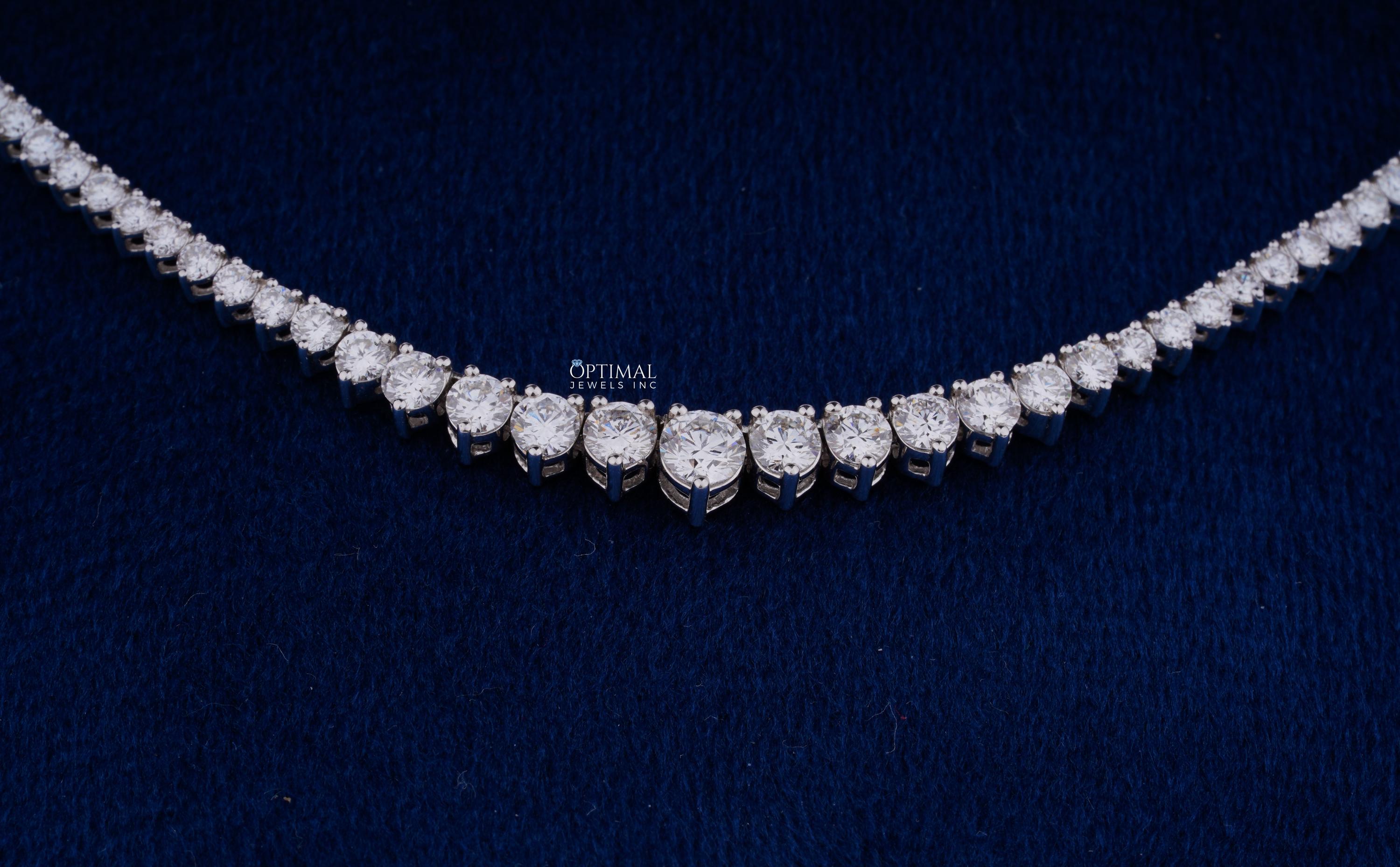 Gorgeous round lab grown diamond necklace featuring 20.50 CTW in an elegant tennis design, set in 18K white gold.