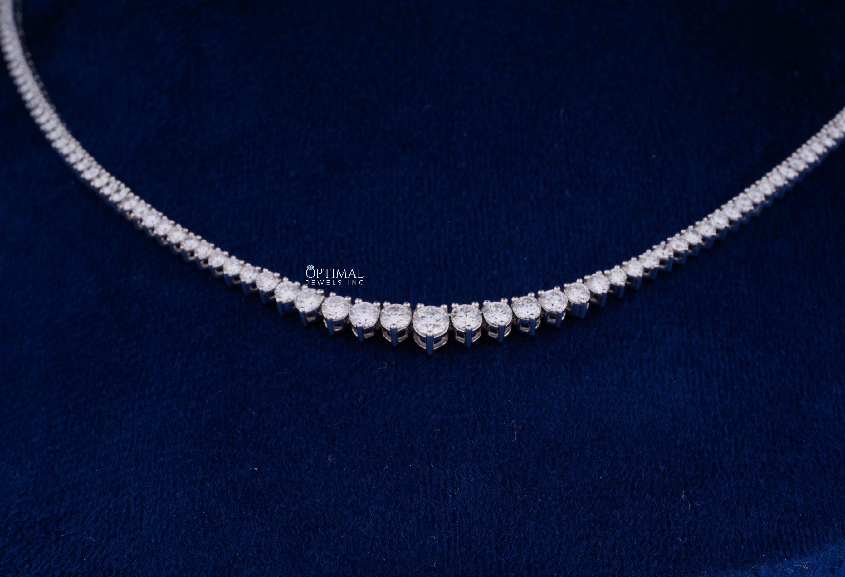 Gorgeous round lab grown diamond necklace featuring 20.50 CTW in an elegant tennis design, set in 18K white gold.