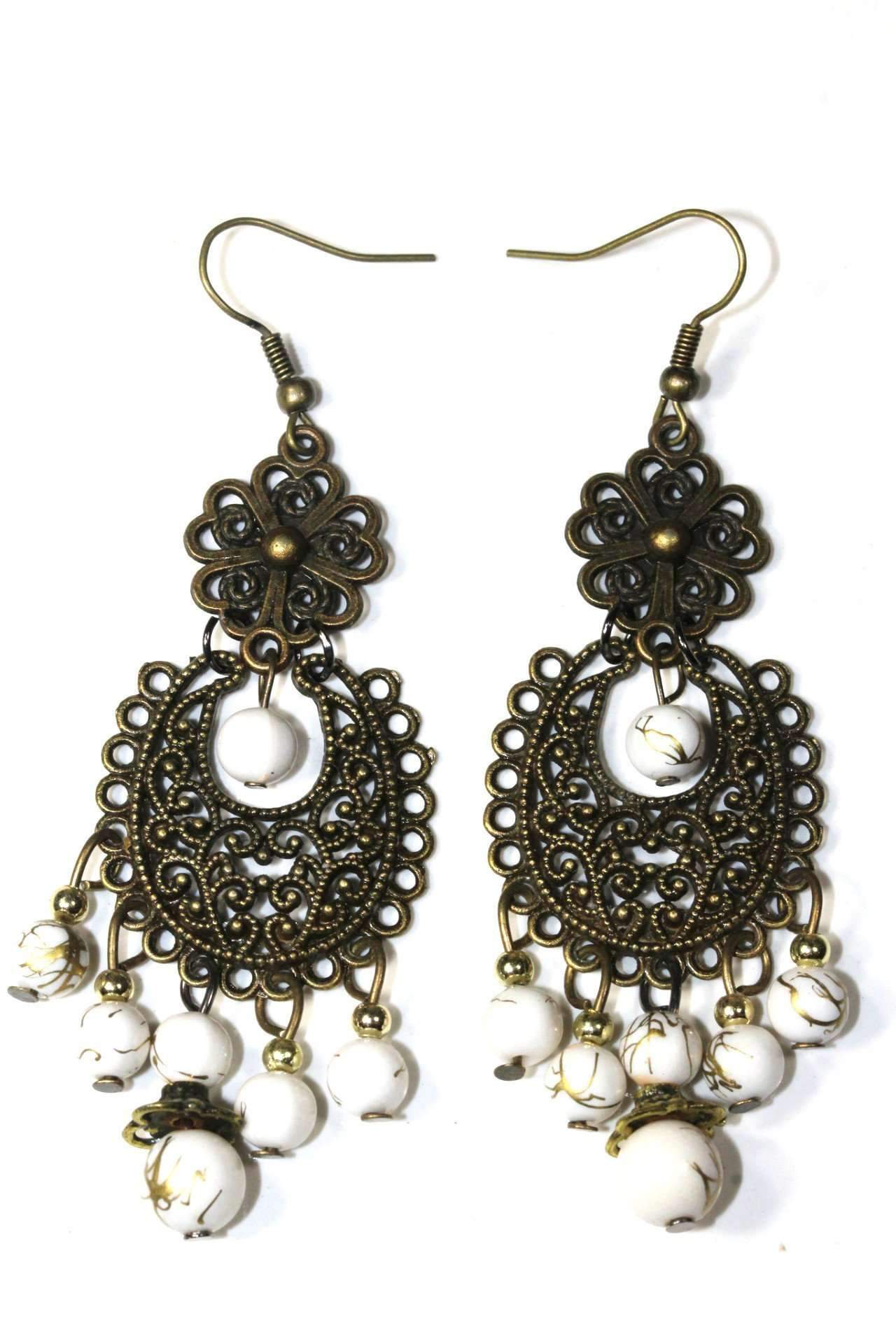 Elegant Grand Boheme Filigree Dangle Earrings featuring intricate floral designs and white beads with golden accents.