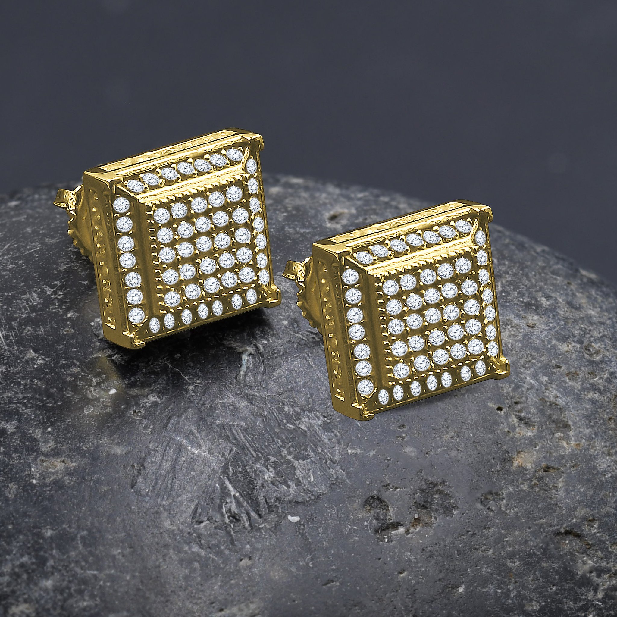Grand-deluxe Screw Back earrings featuring shimmering cubic zirconia stones in a golden base, showcasing a unique cuboid-al design.