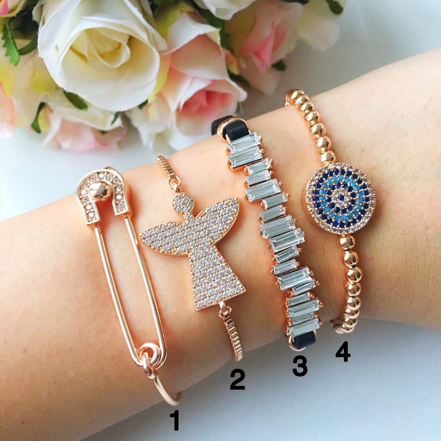 Handmade Greek Evil Eye Bracelet in rose gold, featuring adjustable design and intricate evil eye motif.