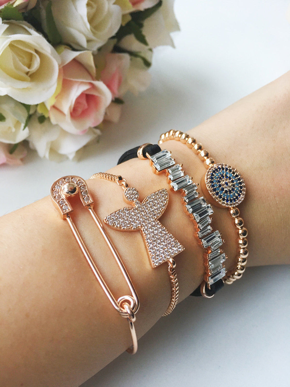 Handmade Greek Evil Eye Bracelet in rose gold, featuring adjustable design and intricate evil eye motif.