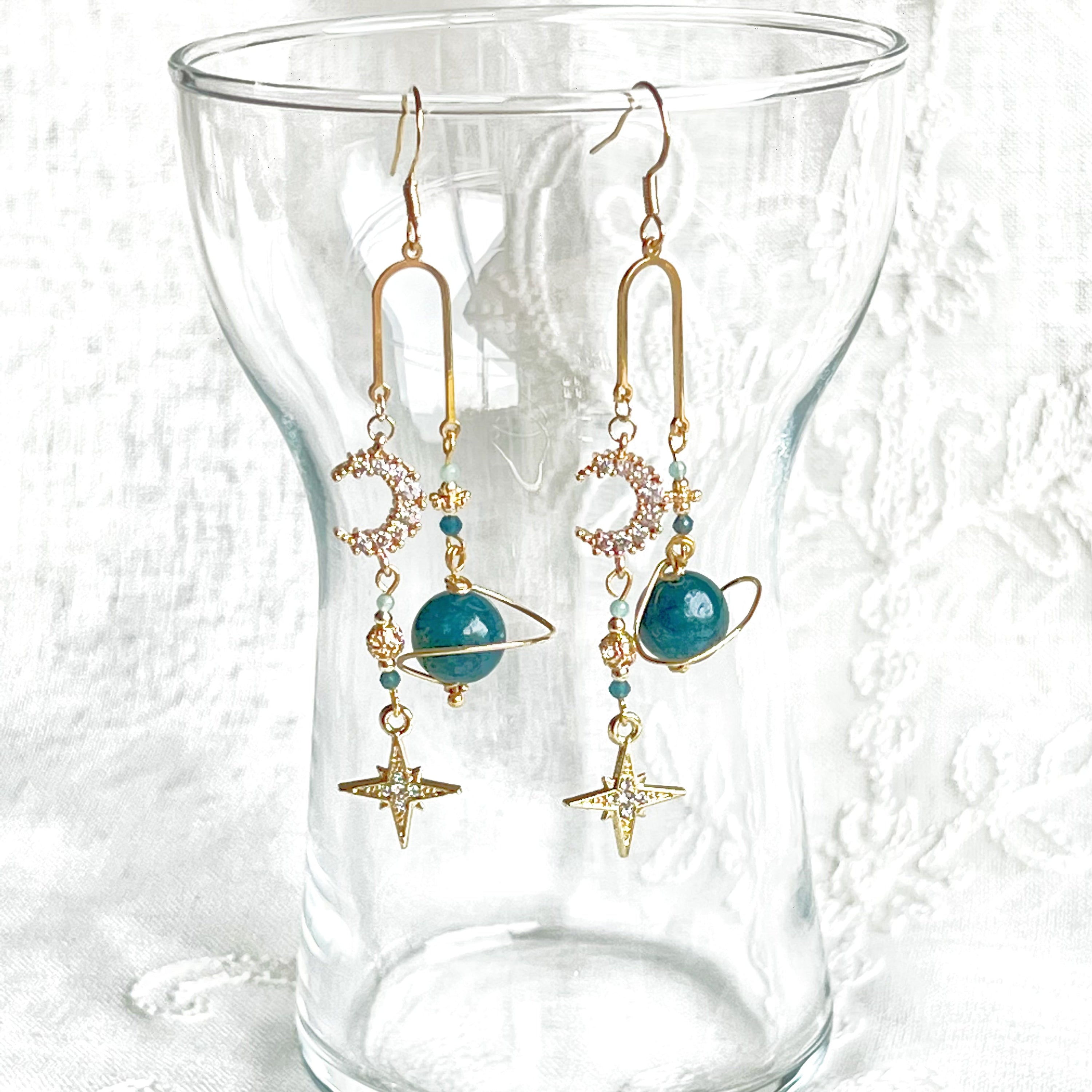 Handmade Green Apatite Planet Moon and North Star Drop Earrings featuring gold-plated bronze wire and sterling silver ear wire.
