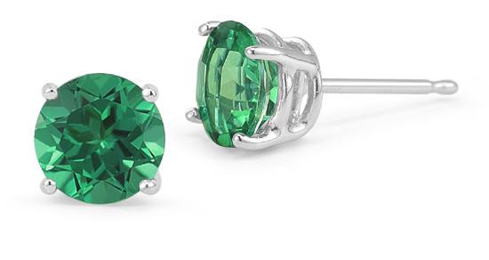 Elegant Green Crystal 6mm Stud Earrings in 14K white gold plating, showcasing their vibrant color and luxurious design.