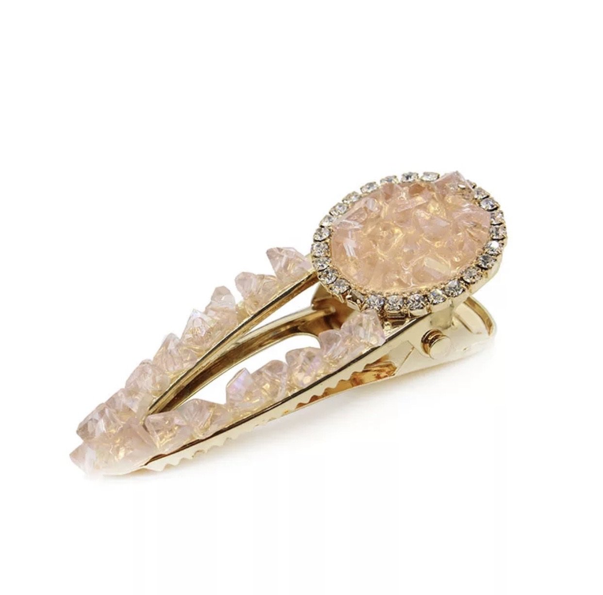 A luxurious Hailie Barrette hair clip with sparkling accents, perfect for adding elegance to any hairstyle.