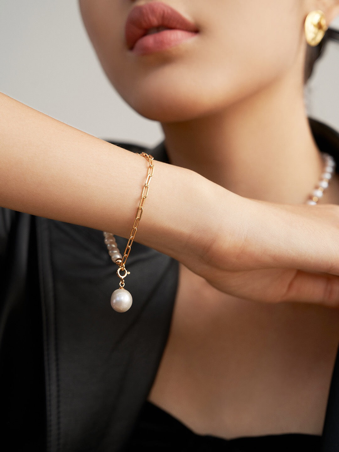 Half Chain Half Pearl Pendant Bracelet featuring natural pearls and sterling silver, elegantly designed for a sophisticated look.