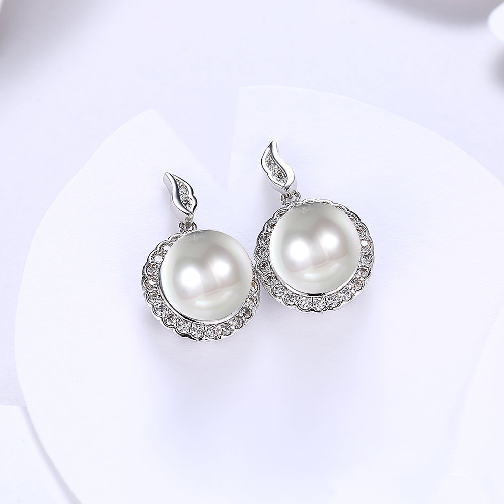 Halo Pave Freshwater Pearl Stud earrings in 18K white gold plating, featuring a classic design with a luxurious finish.