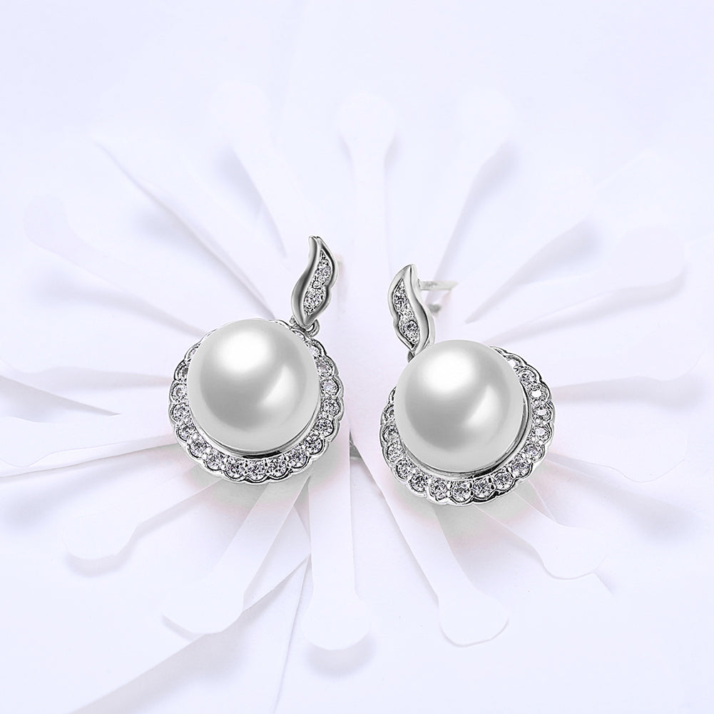 Halo Pave Freshwater Pearl Stud earrings in 18K white gold plating, featuring a classic design with a luxurious finish.
