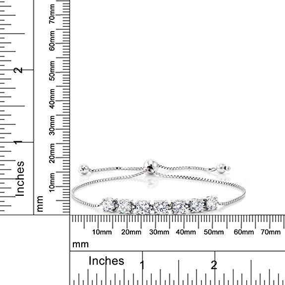 Elegant Halo Stud Earring and Adjustable Tennis Bracelet set, featuring Austrian crystals and 18K gold plating, displayed in a luxurious gift box.