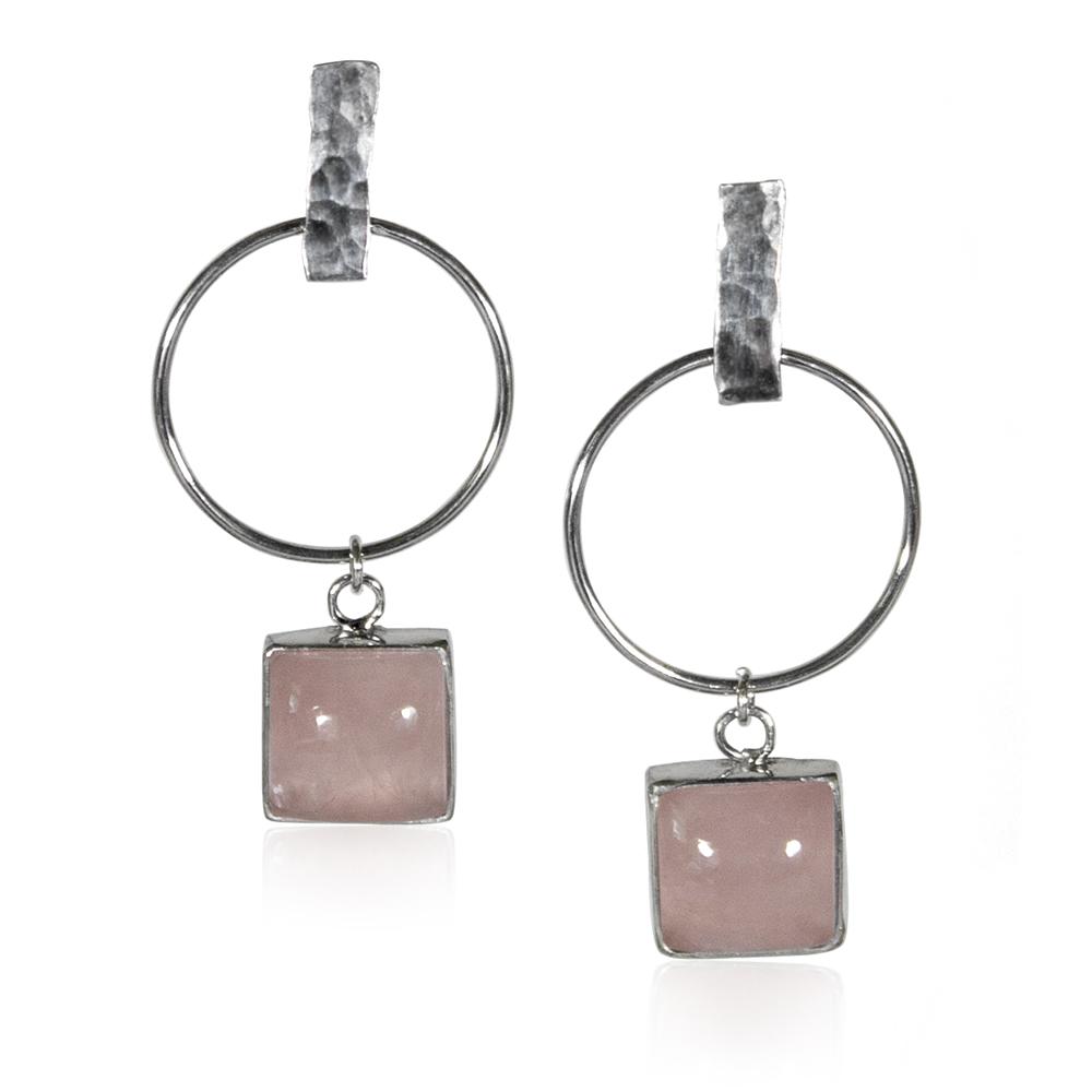 Hammered geometric hoop earrings with rose quartz charm, crafted in sterling silver, showcasing a unique textured design.