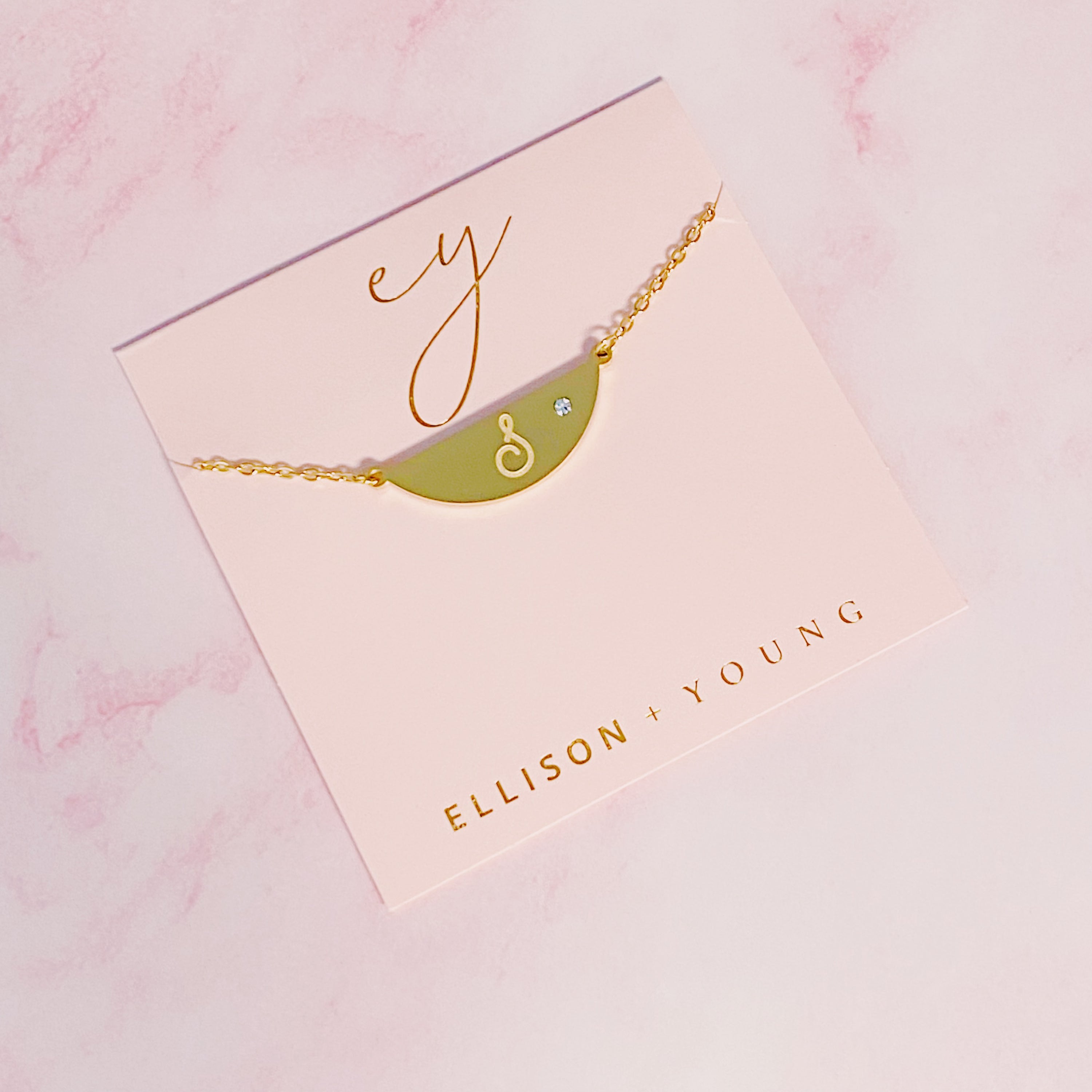 Hamilton Sphere Initial Necklace featuring a modern pendant design with an engraved initial and a brushed finish.