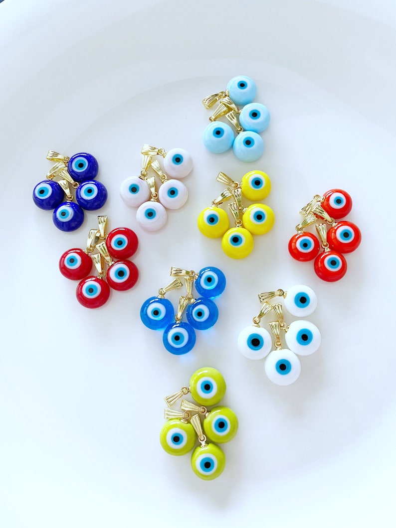 Handmade Murano Evil Eye Necklace featuring a vibrant glass bead and a gold hook, symbolizing protection and good fortune.
