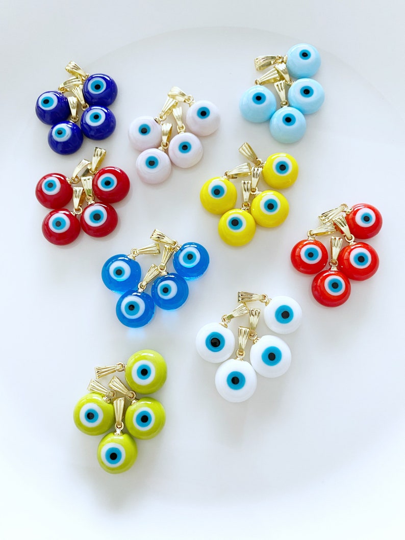 Handmade Murano Evil Eye Necklace featuring a vibrant glass bead and a gold hook, symbolizing protection and good fortune.