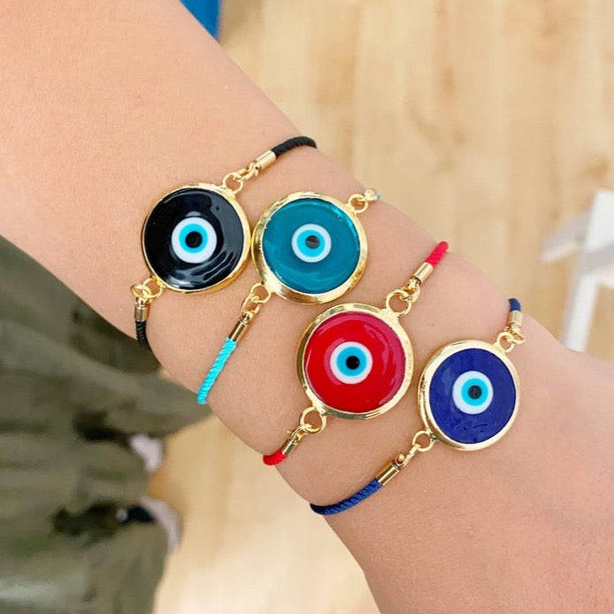 Handmade Murano Bracelet featuring colorful glass beads and adjustable cotton cord with an Evil Eye charm for protection.