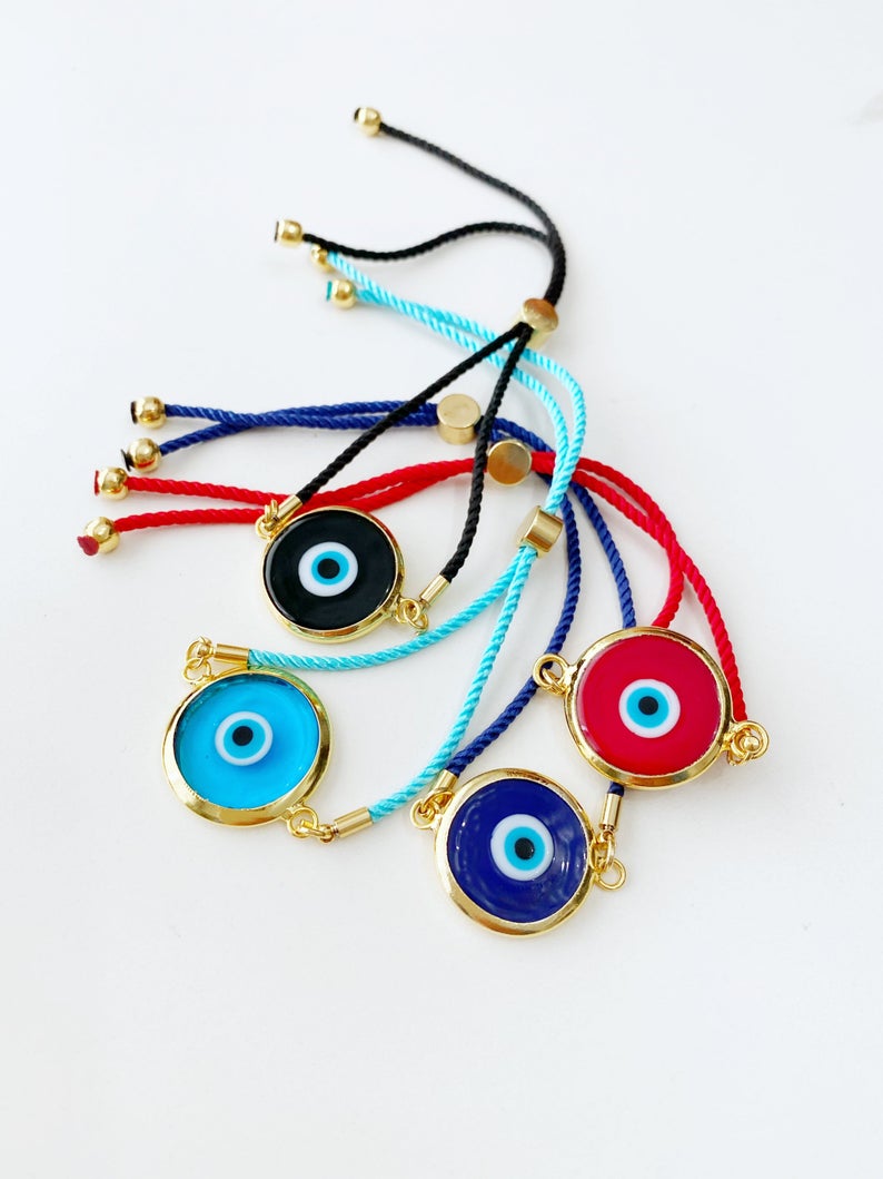 Handmade Murano Bracelet featuring colorful glass beads and adjustable cotton cord with an Evil Eye charm for protection.