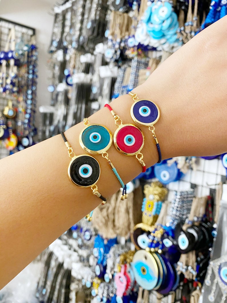 Handmade Murano Bracelet featuring colorful glass beads and adjustable cotton cord with an Evil Eye charm for protection.