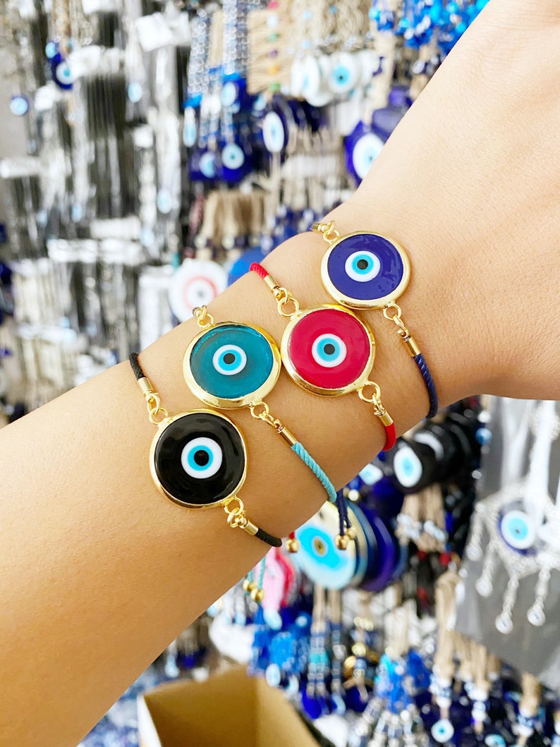 Handmade Murano Bracelet featuring colorful glass beads and adjustable cotton cord with an Evil Eye charm for protection.