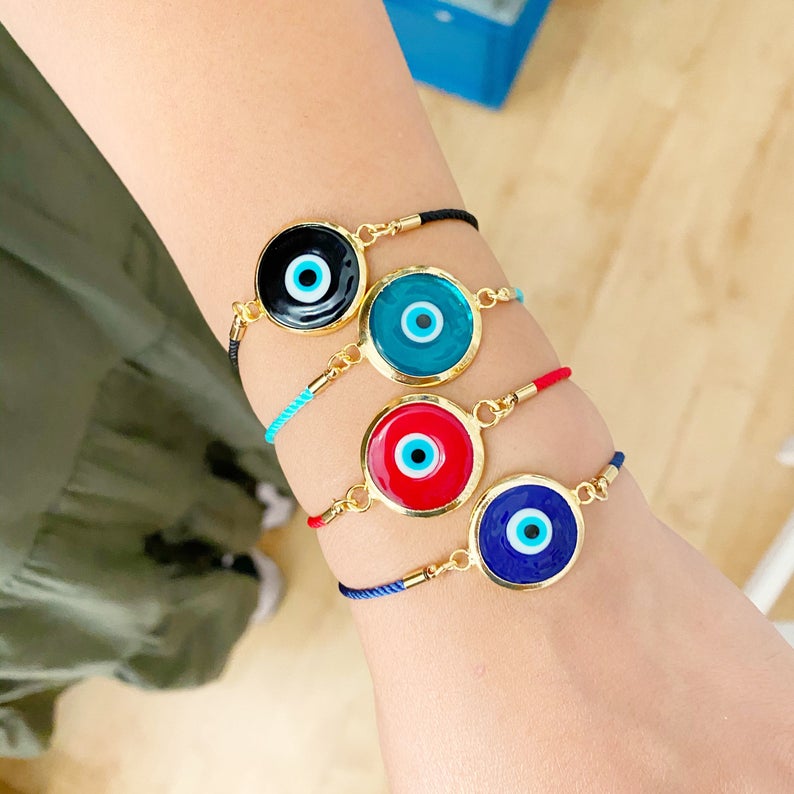 Handmade Murano Bracelet featuring colorful glass beads and adjustable cotton cord with an Evil Eye charm for protection.