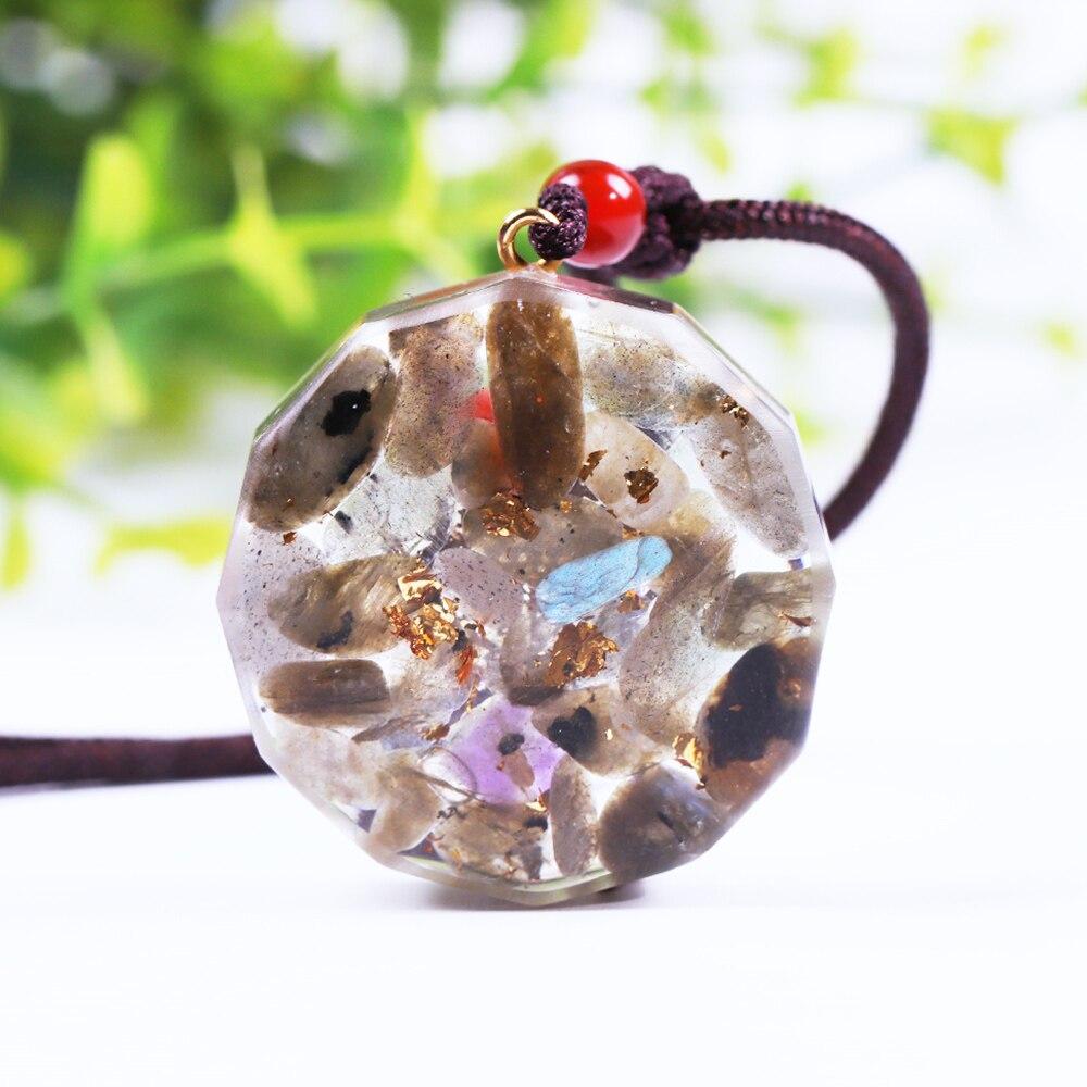 Handmade Orgone Pendant featuring Labradorite, amethyst, and green aventurine in a geometric design, perfect for EMF protection and Reiki healing.