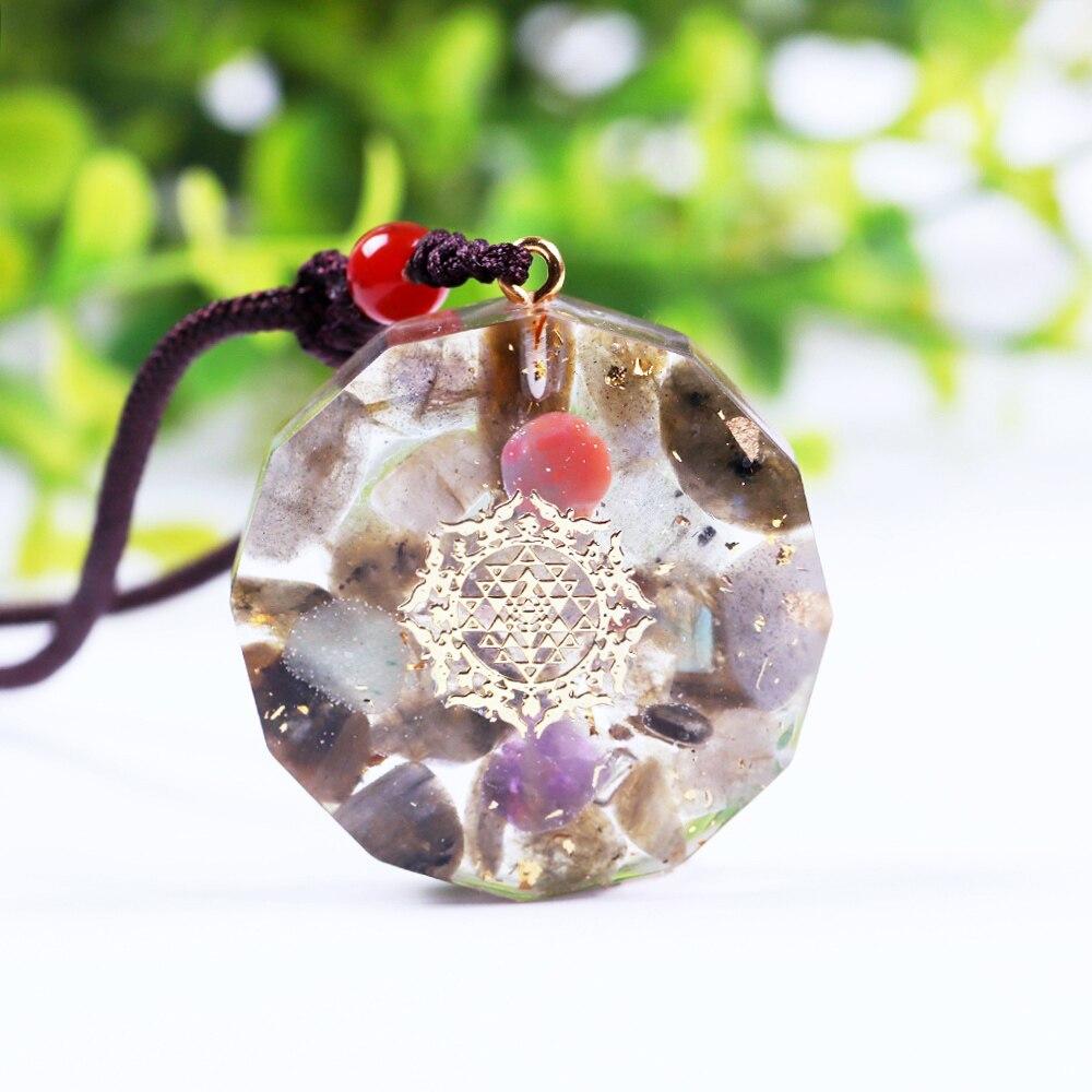 Handmade Orgone Pendant featuring Labradorite, amethyst, and green aventurine in a geometric design, perfect for EMF protection and Reiki healing.
