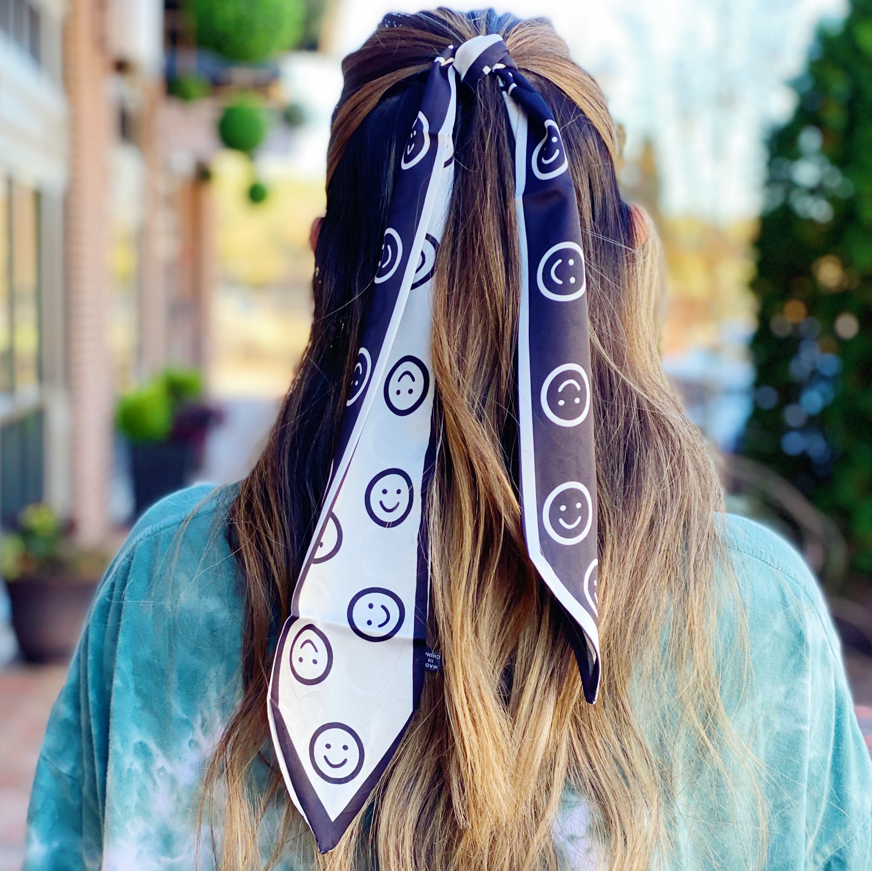 Happy All Around Sleek Scarf featuring cheerful happy faces, slim design, and vibrant colors, perfect for versatile styling.