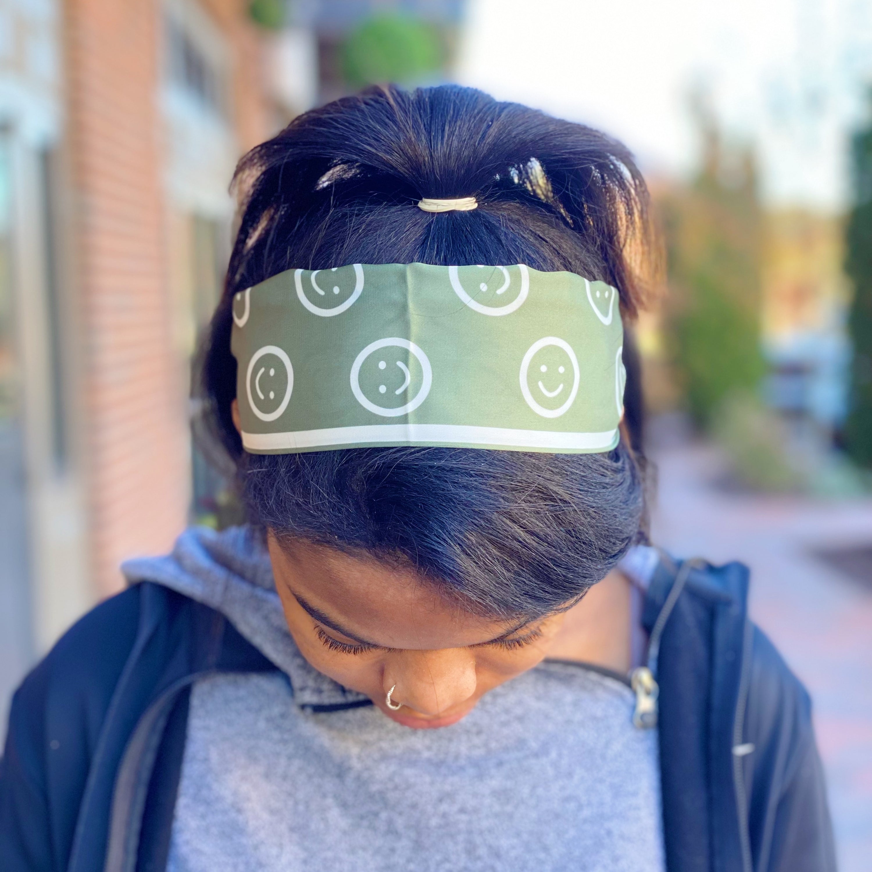 Happy All Around Sleek Scarf featuring cheerful happy faces, slim design, and vibrant colors, perfect for versatile styling.