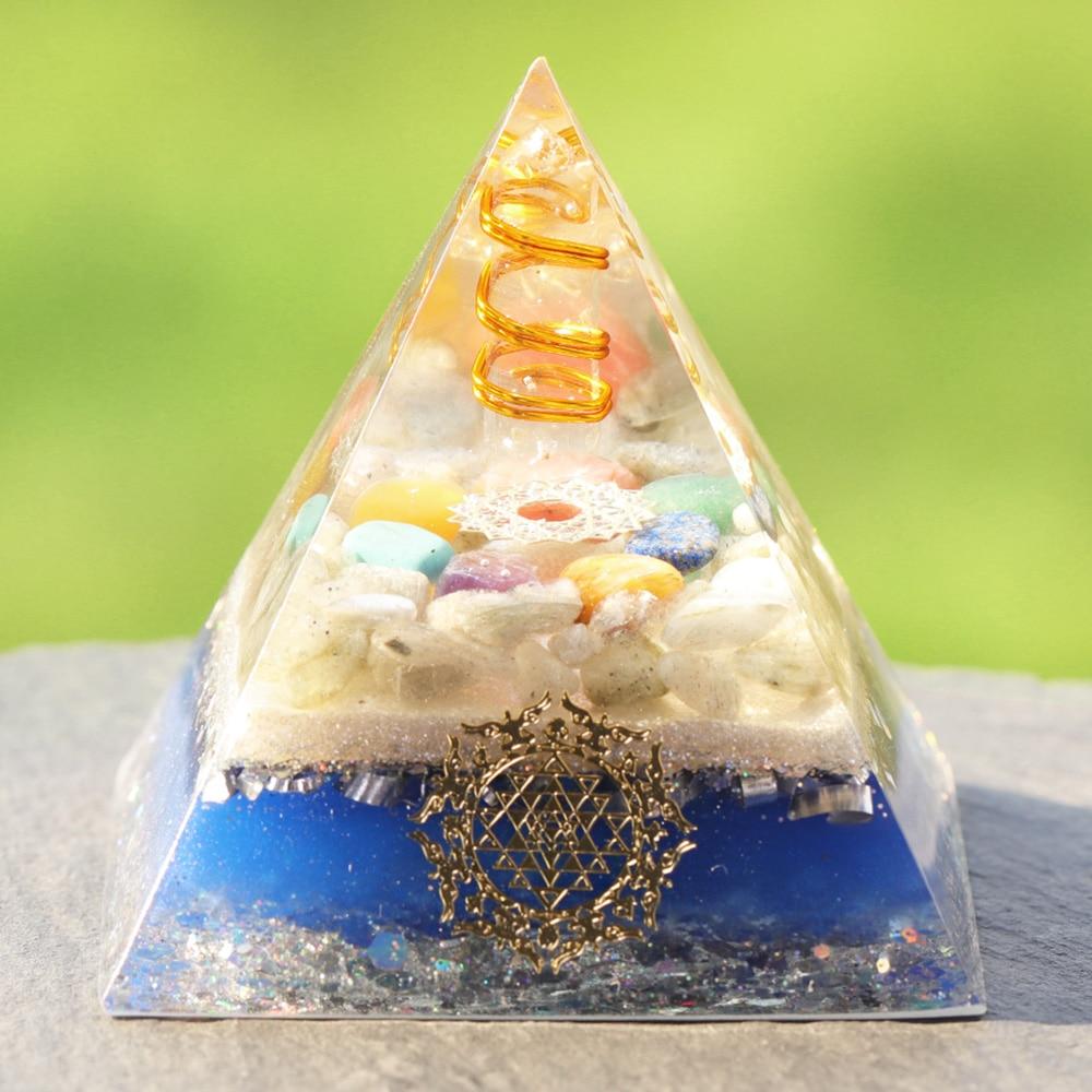 A handcrafted Healing Orgonite Pyramid made from natural stones, featuring a blend of crystal copper, labradorite, and resin, designed for energy generation and healing.