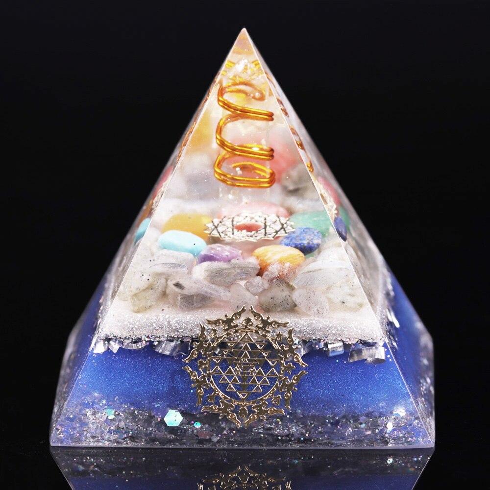 A handcrafted Healing Orgonite Pyramid made from natural stones, featuring a blend of crystal copper, labradorite, and resin, designed for energy generation and healing.
