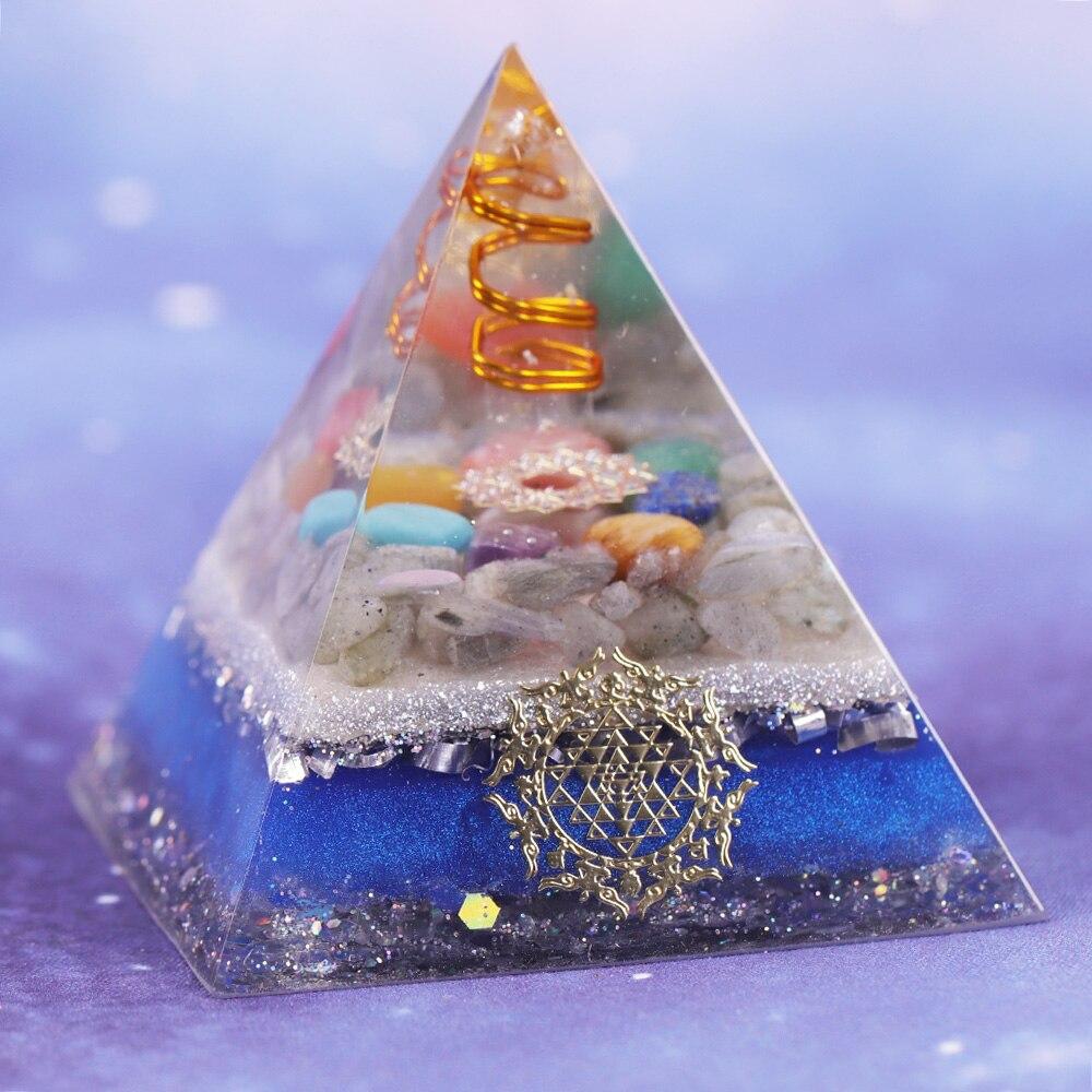 A handcrafted Healing Orgonite Pyramid made from natural stones, featuring a blend of crystal copper, labradorite, and resin, designed for energy generation and healing.