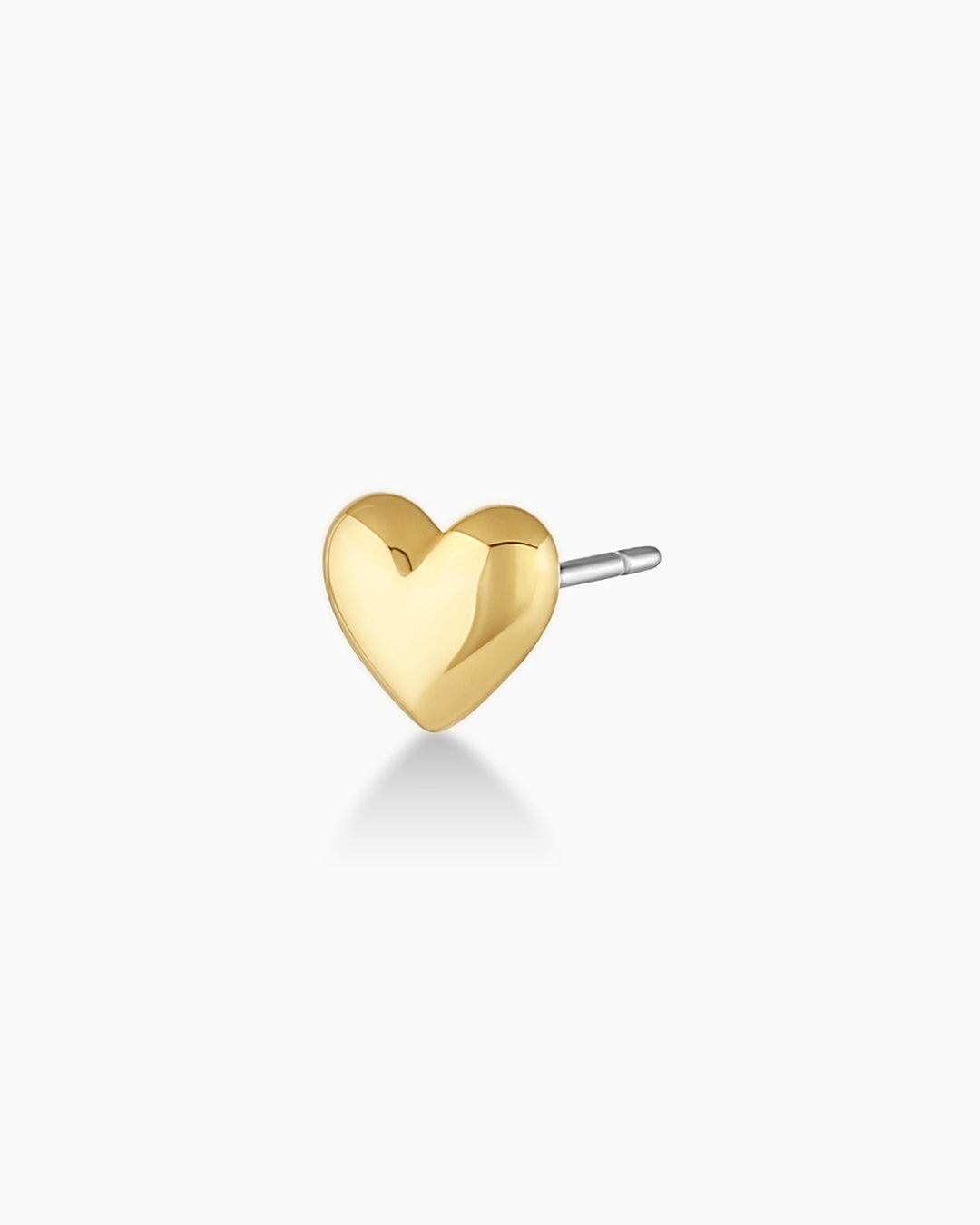 A pair of elegant Heart Charm Stud earrings featuring a delicate heart-shaped design, perfect for everyday wear or special occasions.