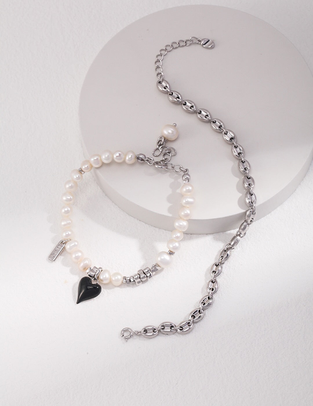 Elegant Heart Pendant Pearl Bracelet featuring natural pearls and sterling silver, perfect for any occasion.
