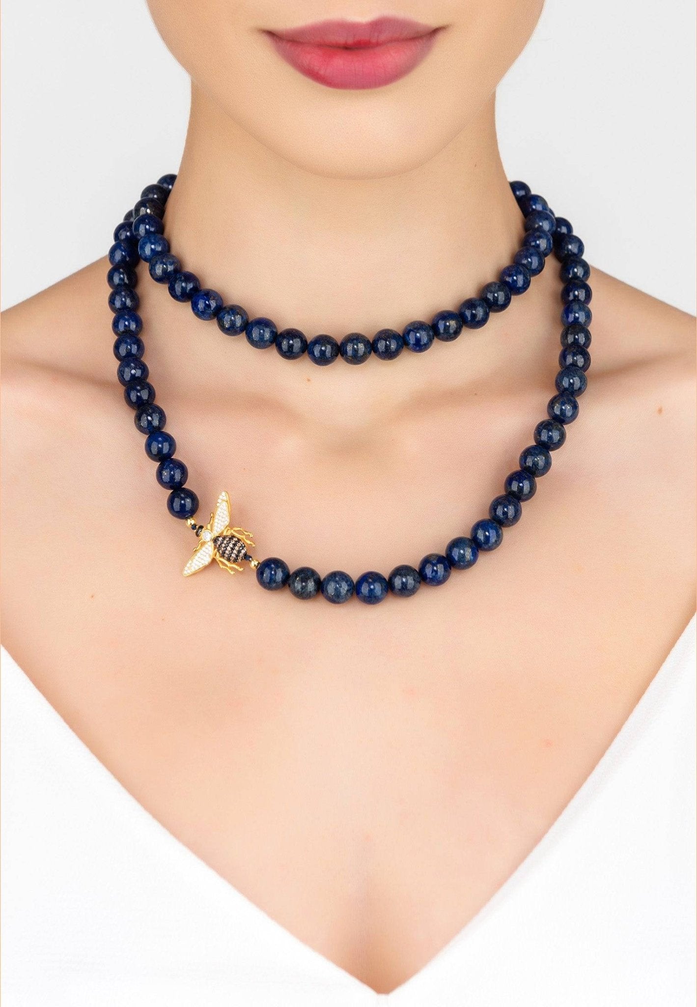 Elegant Honey Bee Lapis Lazuli Gemstone Long Necklace featuring a gold-dipped design and zirconia-encrusted bee motif.