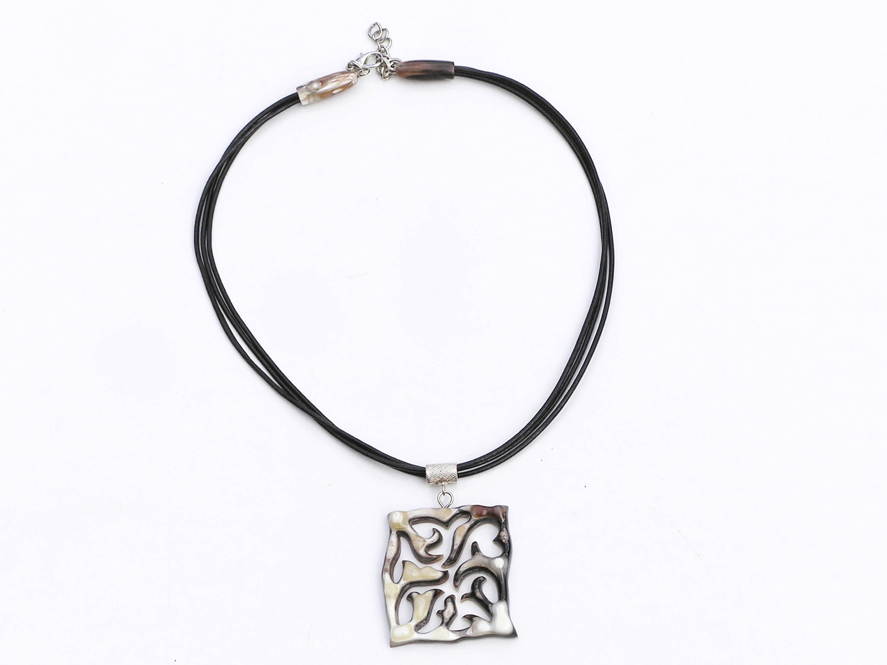 Elegant handmade buffalo horn necklace featuring intricate carvings and a unique color gradient from black to light gray.