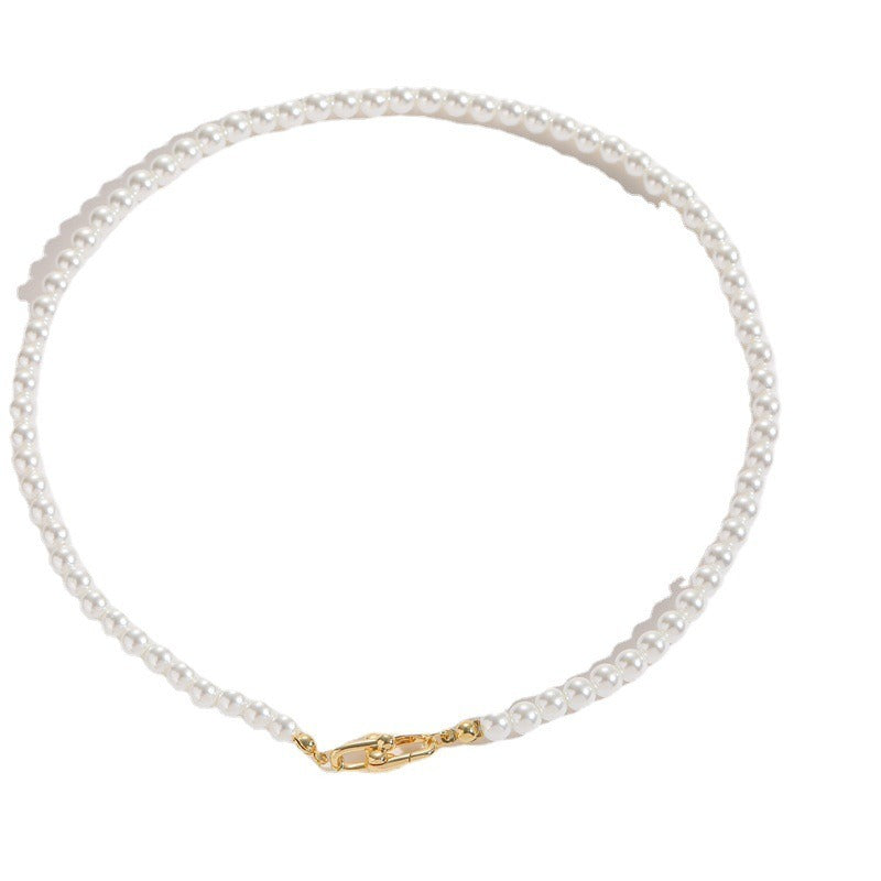 A beautiful Horseshoe Button Open Pendant Pearl Necklace featuring an imitation pearl and Mother of Pearl Shell pendant, showcasing a vintage French design.