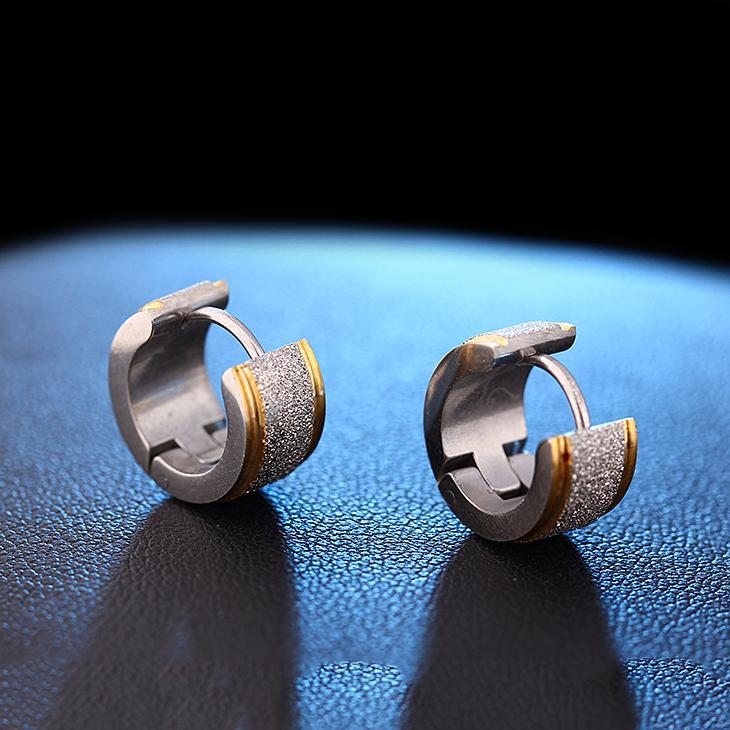 Elegant Huggie Earring in 18K white gold plating, showcasing a sleek and modern design perfect for everyday wear.