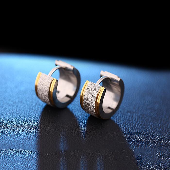 Elegant Huggie Earring in 18K white gold plating, showcasing a sleek and modern design perfect for everyday wear.