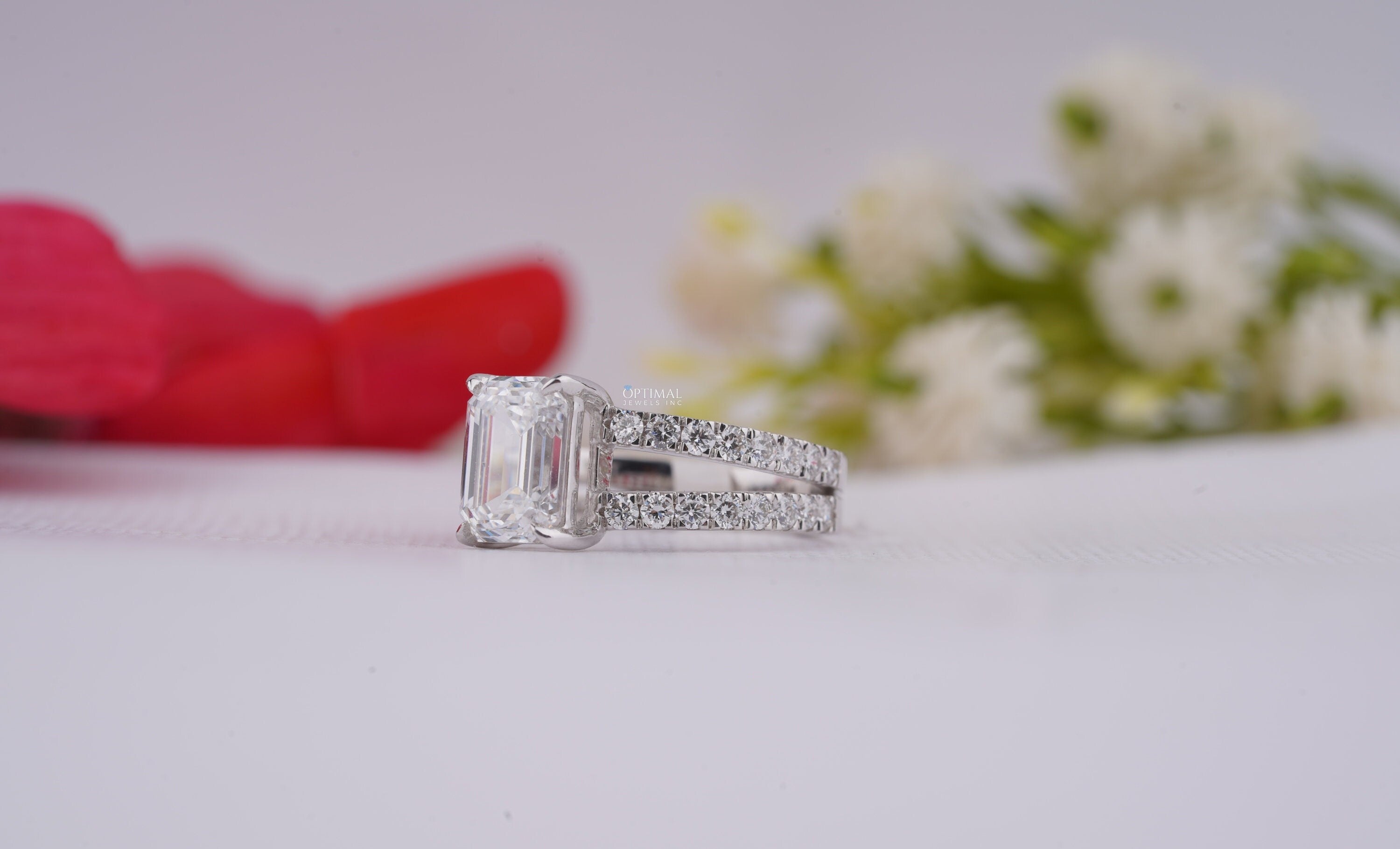 IGI Certified 2.74 Ctw Emerald Cut Lab Grown Diamond Ring in 18K White Gold, featuring a double band and pave set design.
