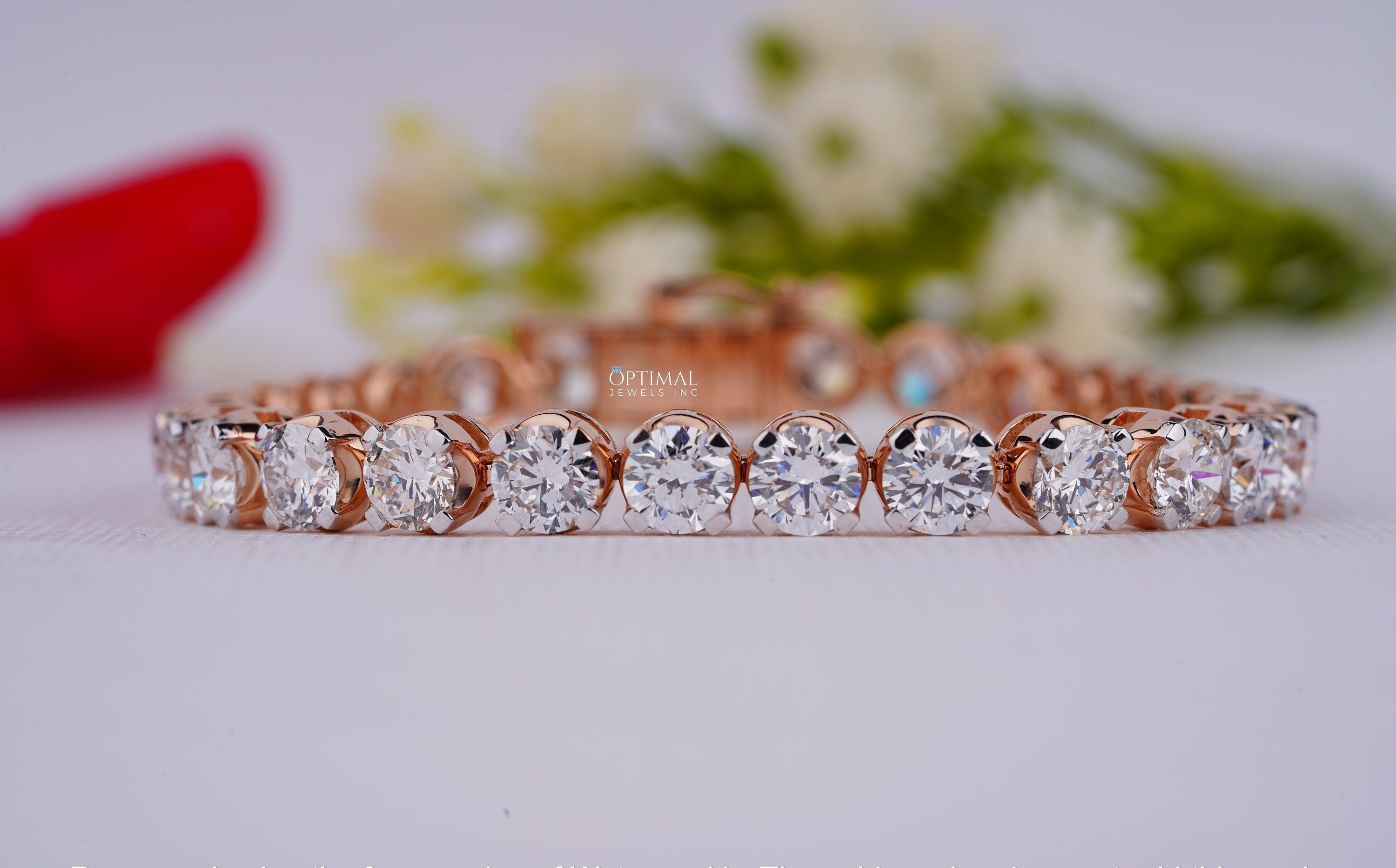 A stunning 23.00 CTW lab-grown round diamond bracelet in rose gold, featuring a tennis design suitable for both men and women.