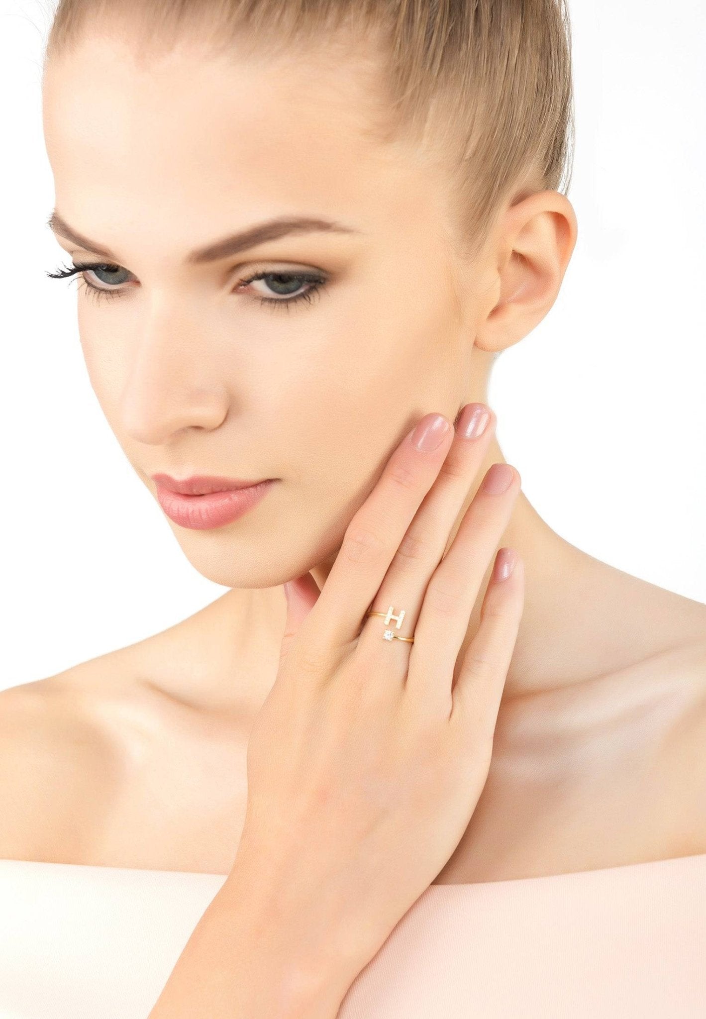 Initial Ring Gold H featuring an elegant design with a monogram and cubic zirconia, handcrafted in 925 sterling silver and dipped in 22ct gold.