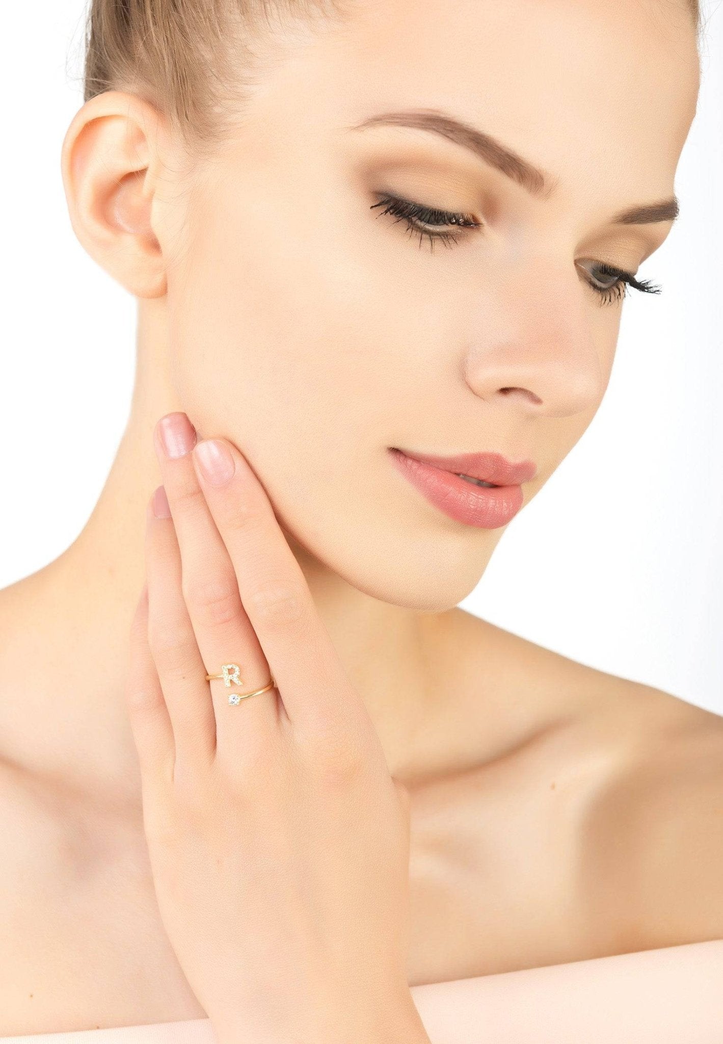 Initial Ring Gold R featuring a delicate design with cubic zirconia, handcrafted in 925 sterling silver and dipped in 22ct gold.