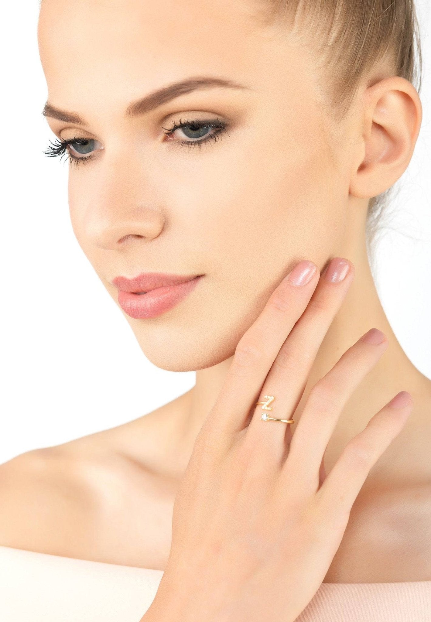 Initial Ring Rosegold Z featuring a delicate design with cubic zirconia, handcrafted in 925 sterling silver and dipped in 22ct rose gold.