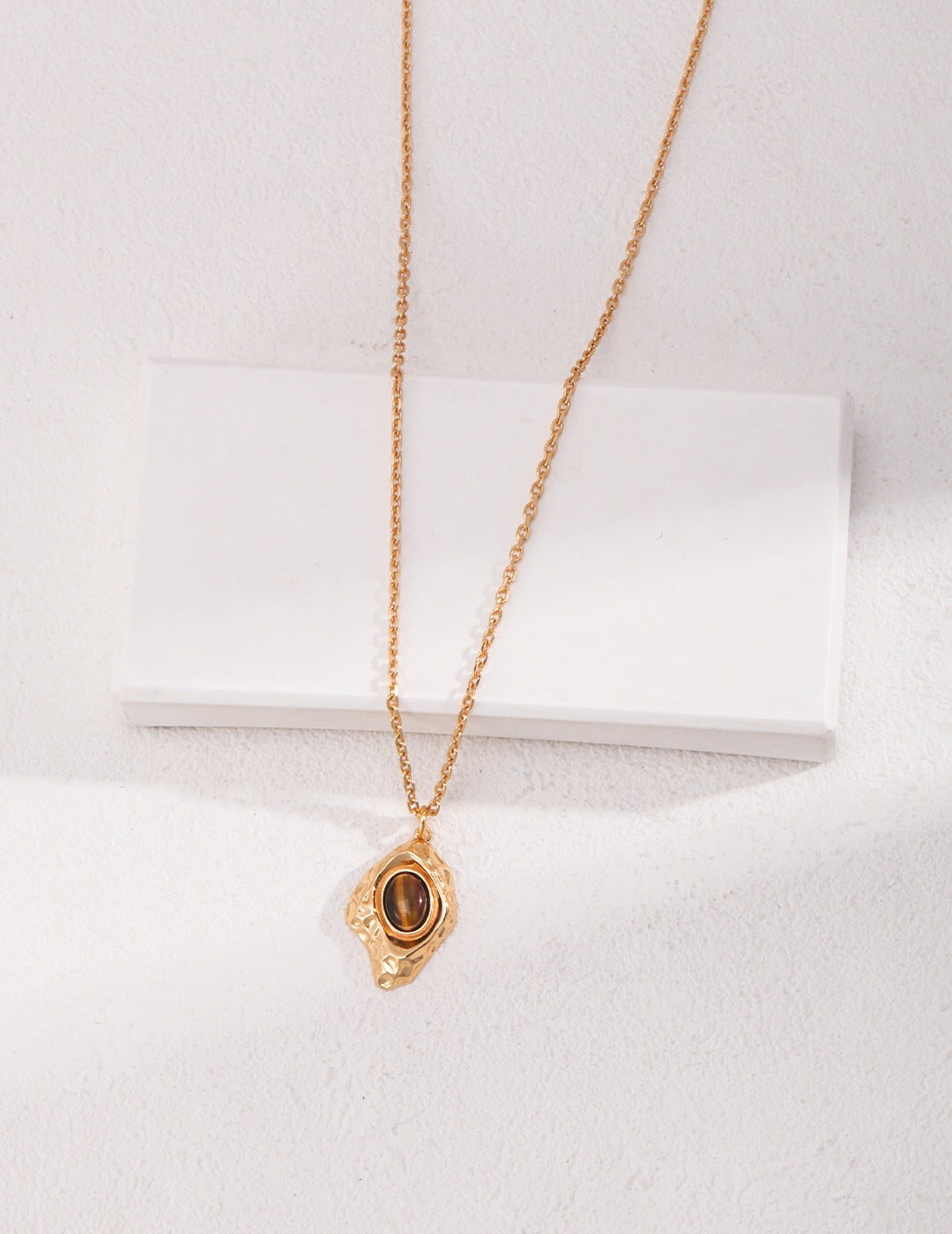 Handmade Irregular Rhombus Tigers Eye Stone Pendant Necklace with gold vermeil chain, showcasing its unique design and natural beauty.
