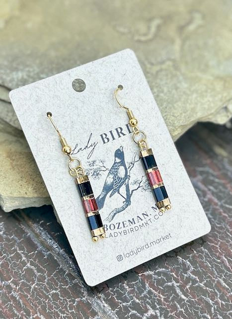 A pair of elegant Jet Black, Gold & Shiny Red Tila Bead Earrings showcasing vibrant colors and unique design.