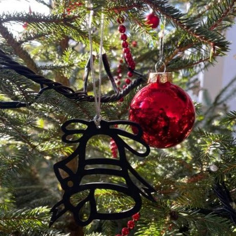 Handcrafted Jingle Bell Eco Friendly Christmas Decoration made from reclaimed inner tube, showcasing unique design and eco-friendly materials.