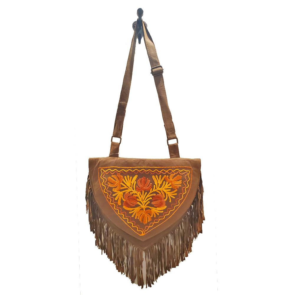 Kashida Embroidery of Bihar Suede Purse featuring intricate designs and a fringe tassel shoulder strap.