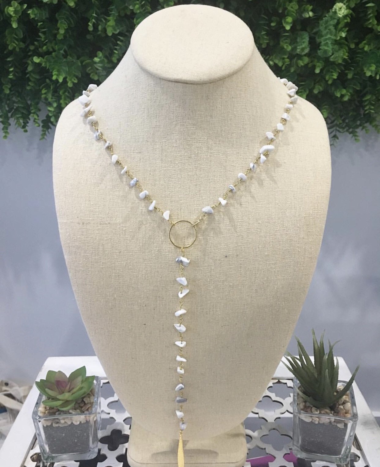 Kenlyn Lariat Necklace featuring gemstone chips including sunstone, howlite, labradorite, and lapis lazuli, elegantly designed for versatile wear.