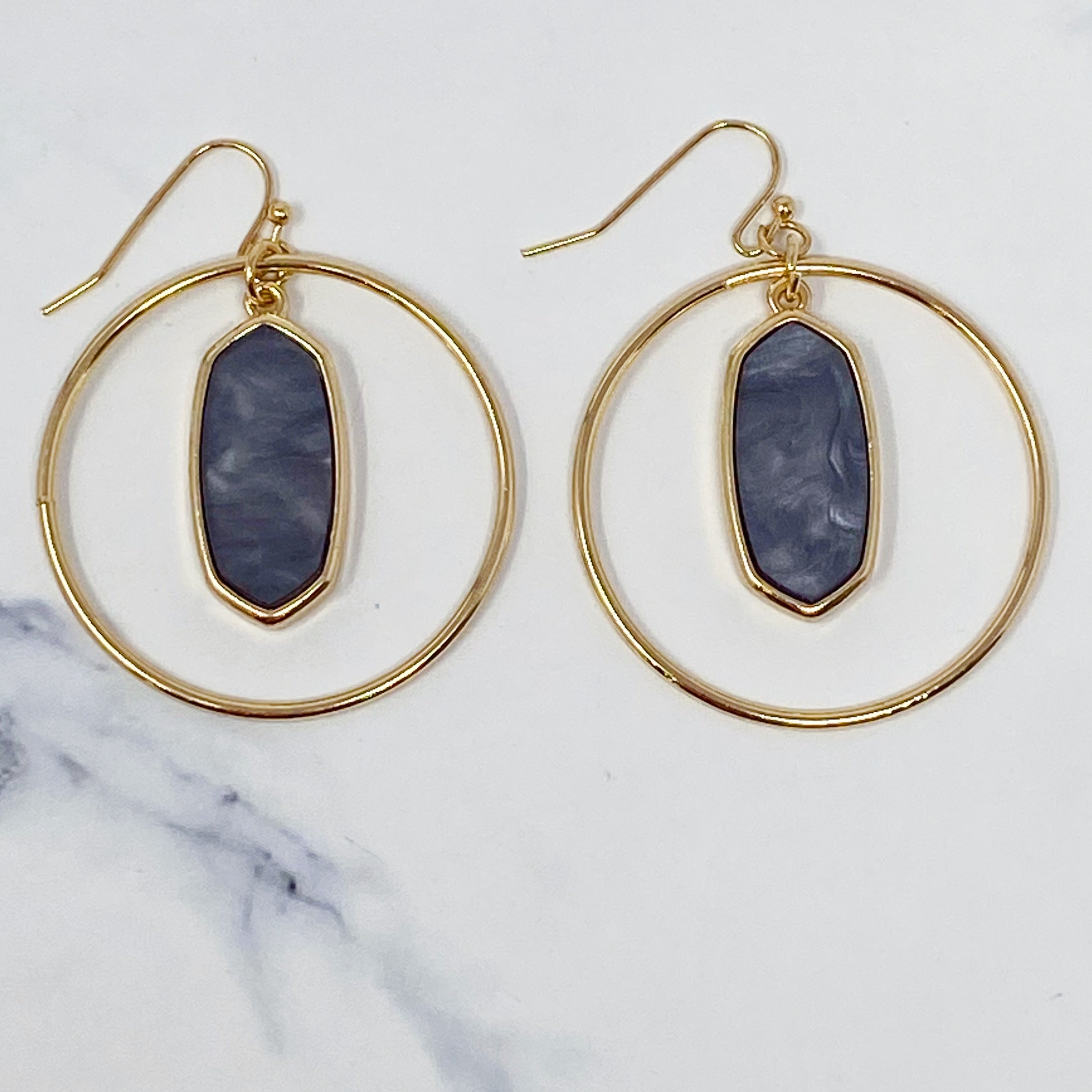 Kenzie Circle Drop Earrings featuring a dangling hoop design with a beautiful center piece, crafted from alloy metal.