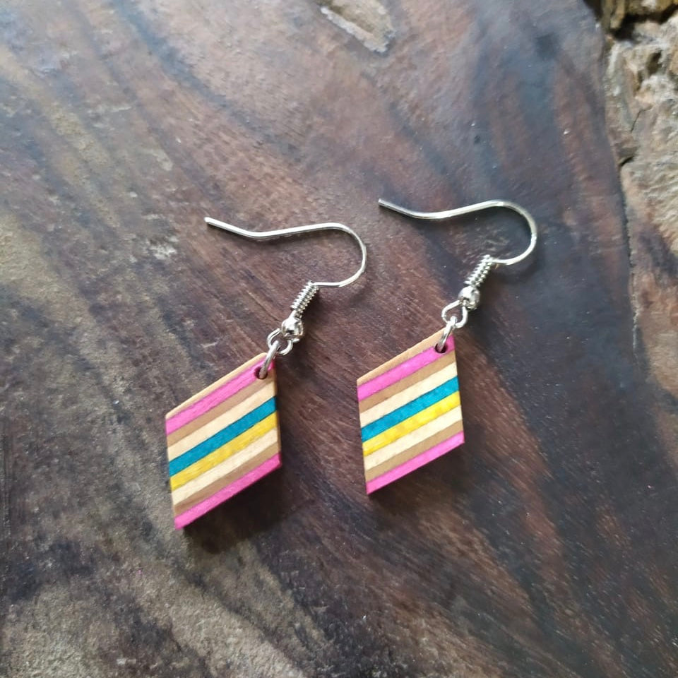 Kite Recycled Skateboard Dangle Earrings showcasing vibrant colors and unique patterns, handcrafted from upcycled skateboards.