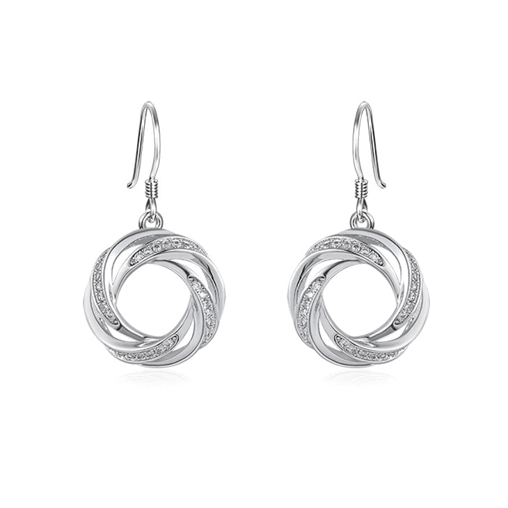 Lachouette twist circle sterling silver earrings featuring white sapphire, elegantly designed with a twist pattern.