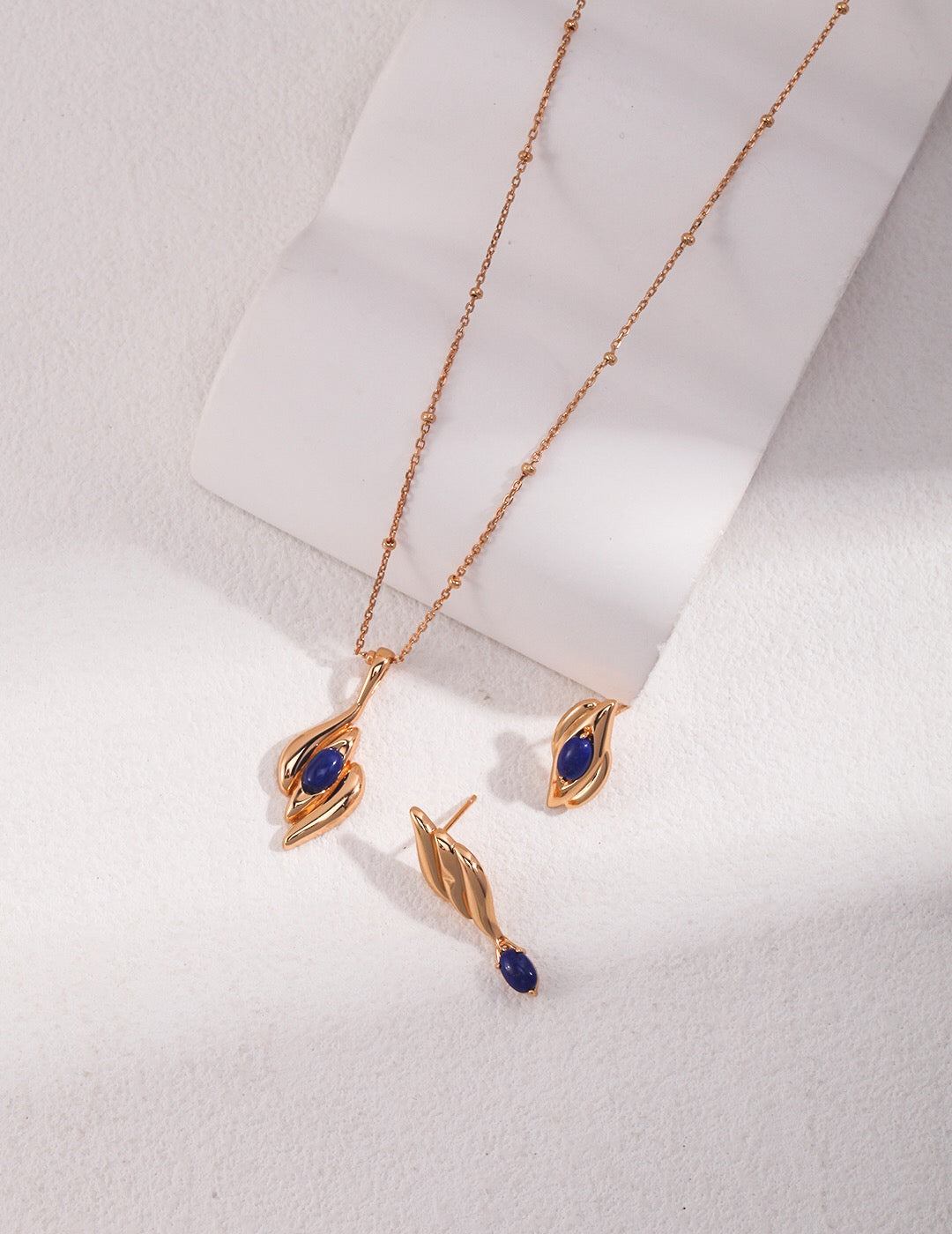 Lapis Lazuli Inlaid Medieval Necklace featuring freshwater pearls and gold vermeil, showcasing its intricate design and vibrant colors.